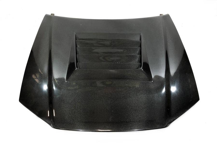 capo-carbono-nissan-skyline-r34-gtr-con-toma.jpg Capó Carbono Nissan Skyline R34 GTR Con Toma